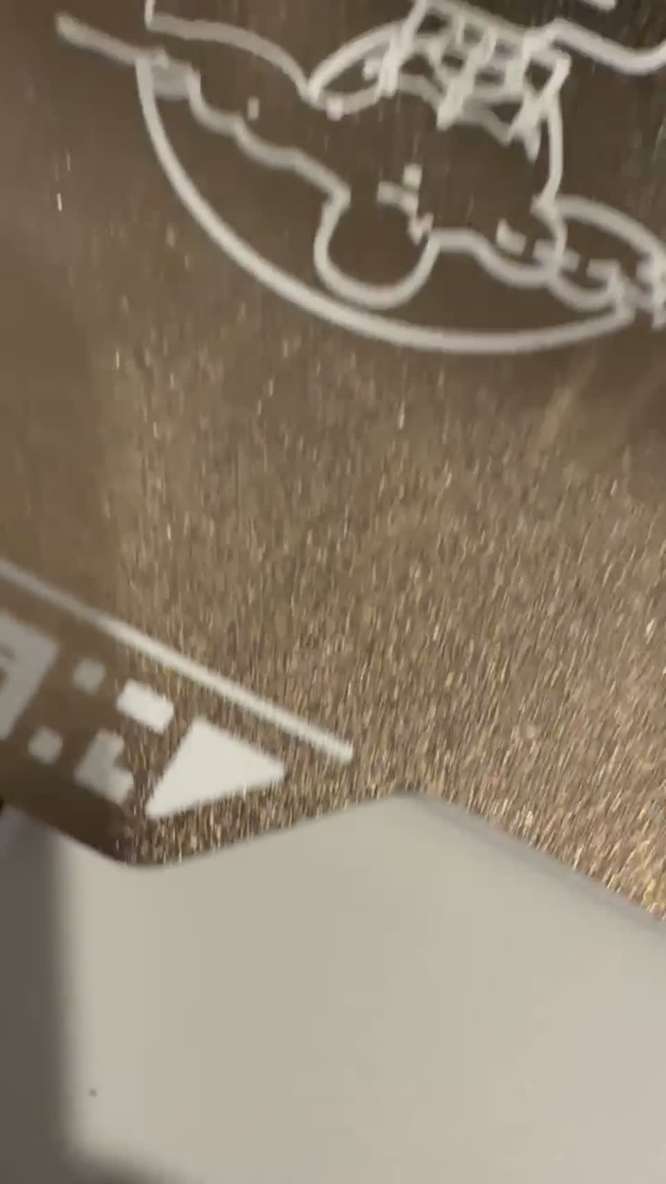 3D printer actively printing a part in our workshop